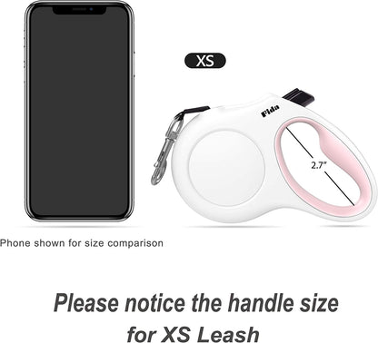 White and pink retractable dog leash - handle size compared to a phone