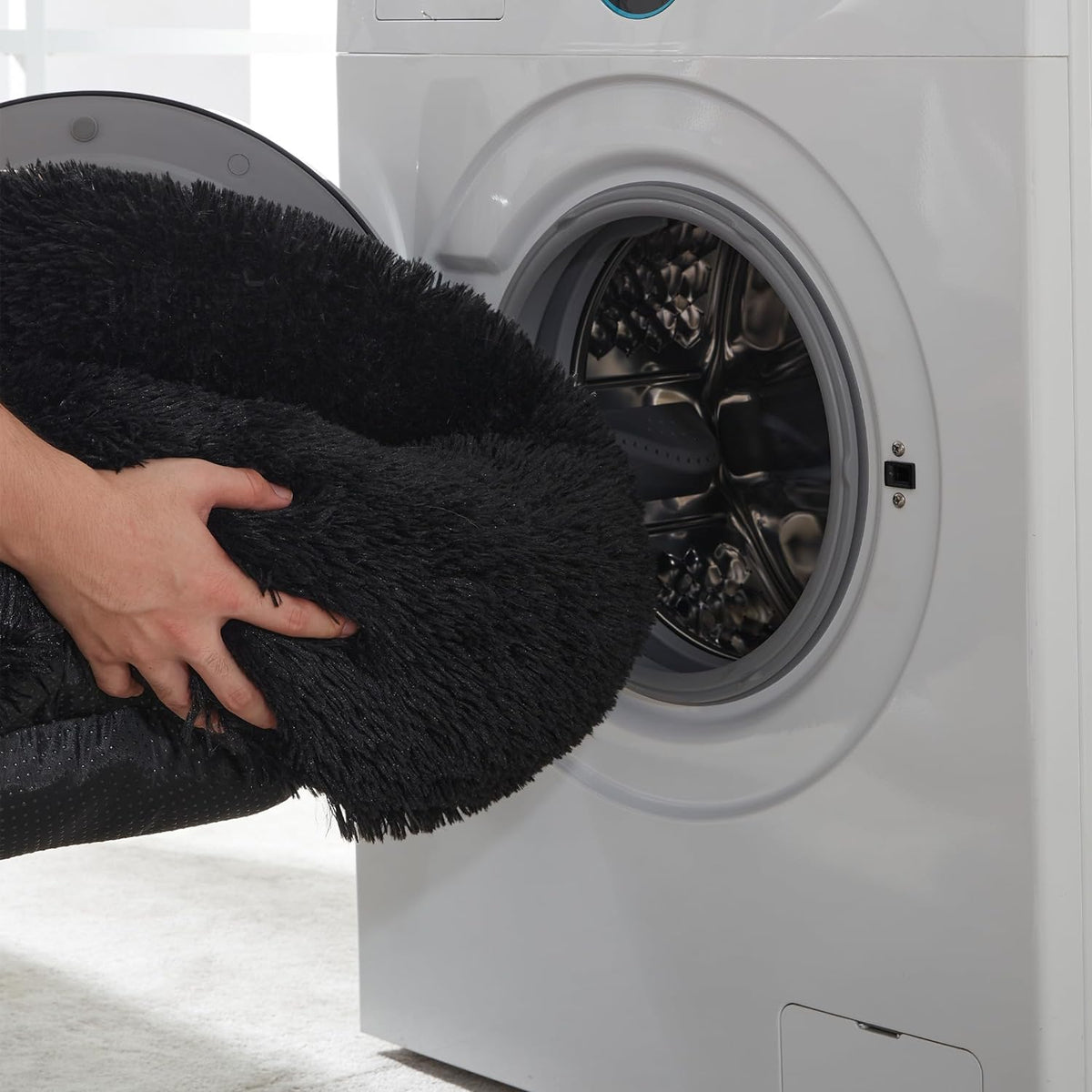 Black faux fur calming donut bed - machine washable